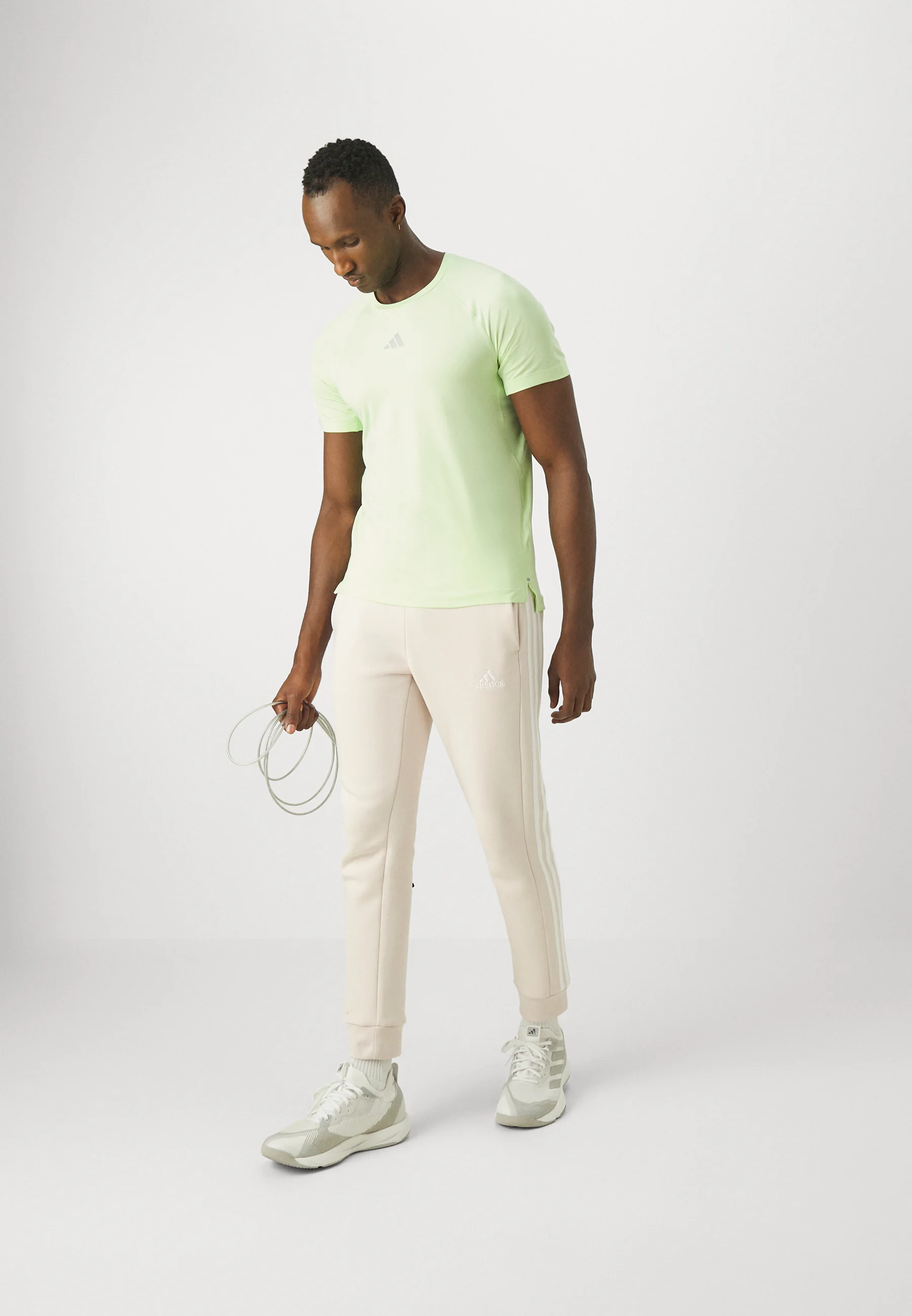 Sportswear ESSENTIALS TAPERED CUFF PANTS - Pantaloni sportivi