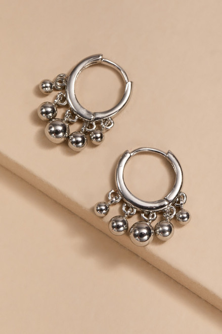 Monique Shaky Ball Charm On Huggie Earrings