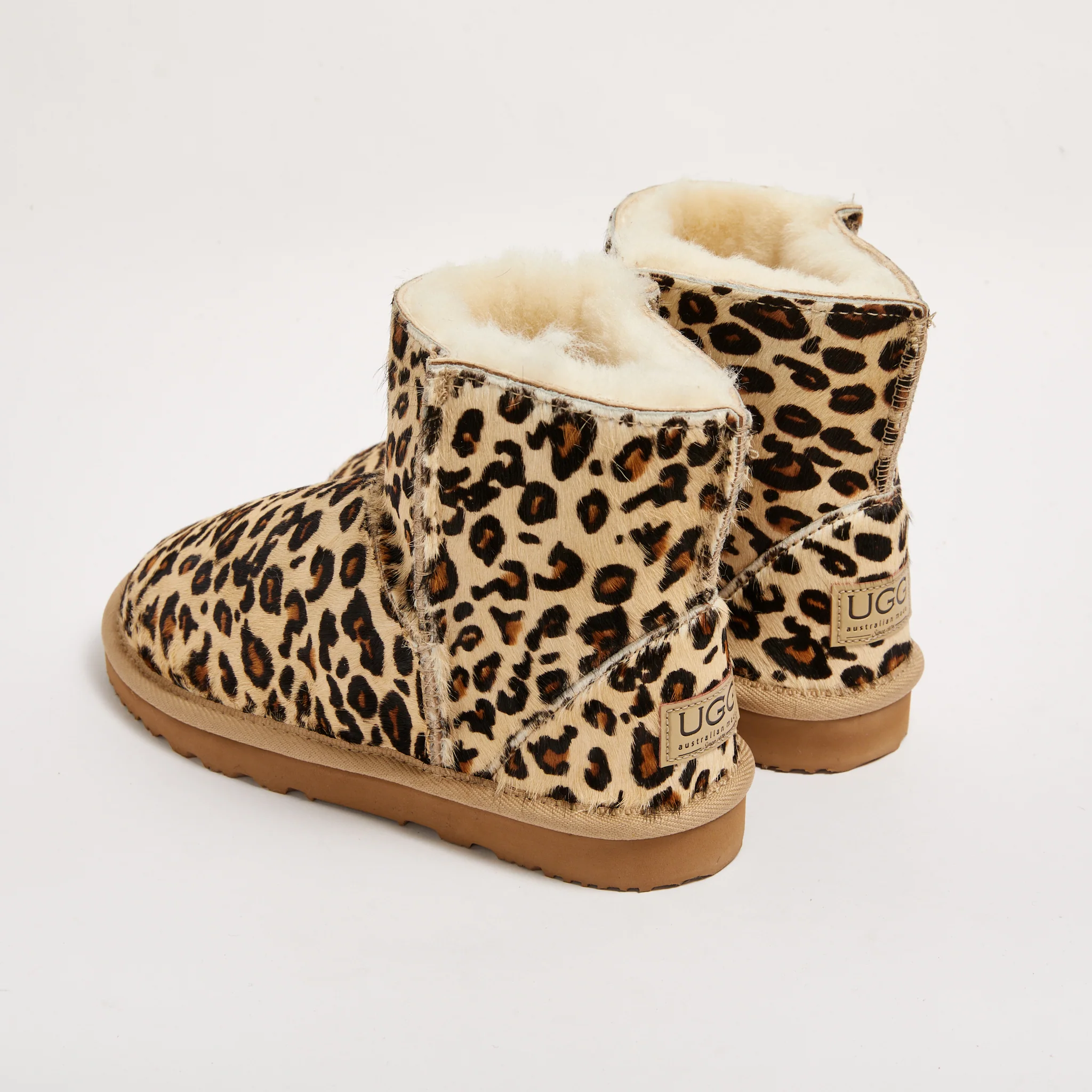 UGG®  Women's Baby Leopard Mini