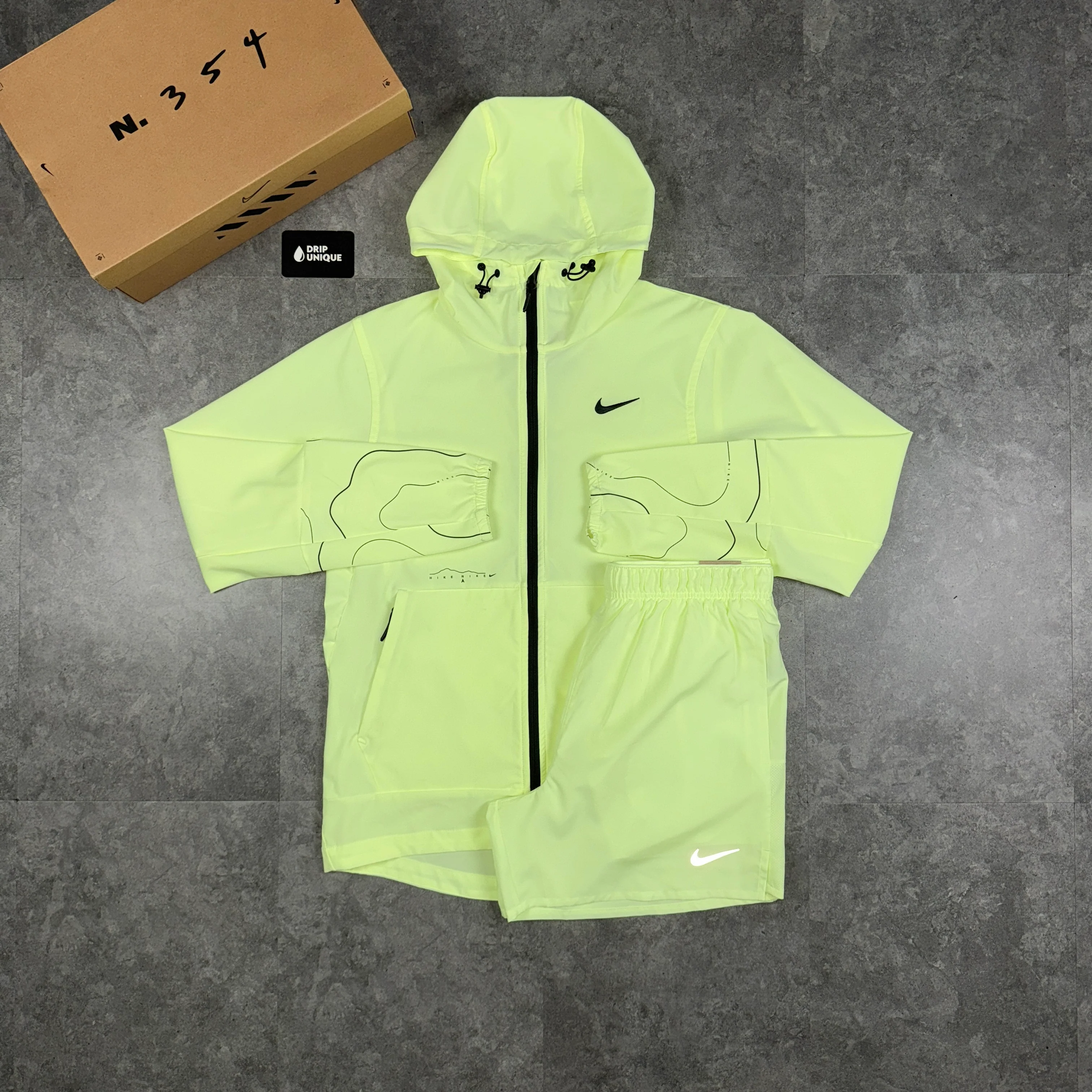 NK Repel “Just Do It” Windrunner Jacket Barely Volt & Volt Challenger Shorts Set