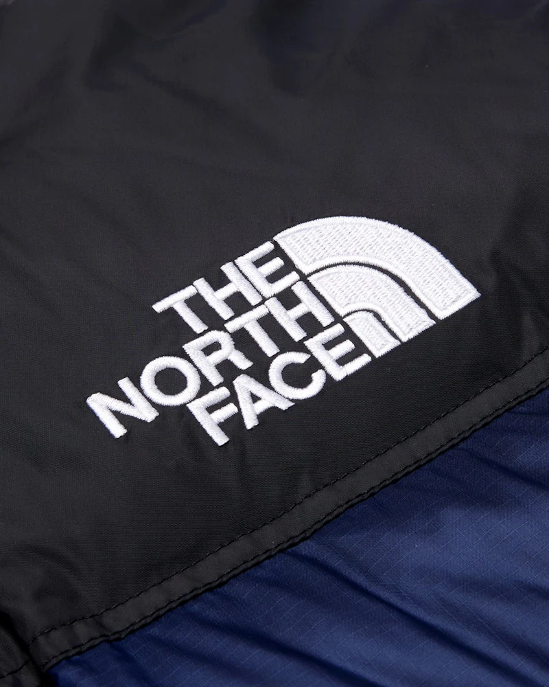 TNF 1996 Retro Nuptse 700 Fill Packable Jacket Summit Navy/TNF Black
