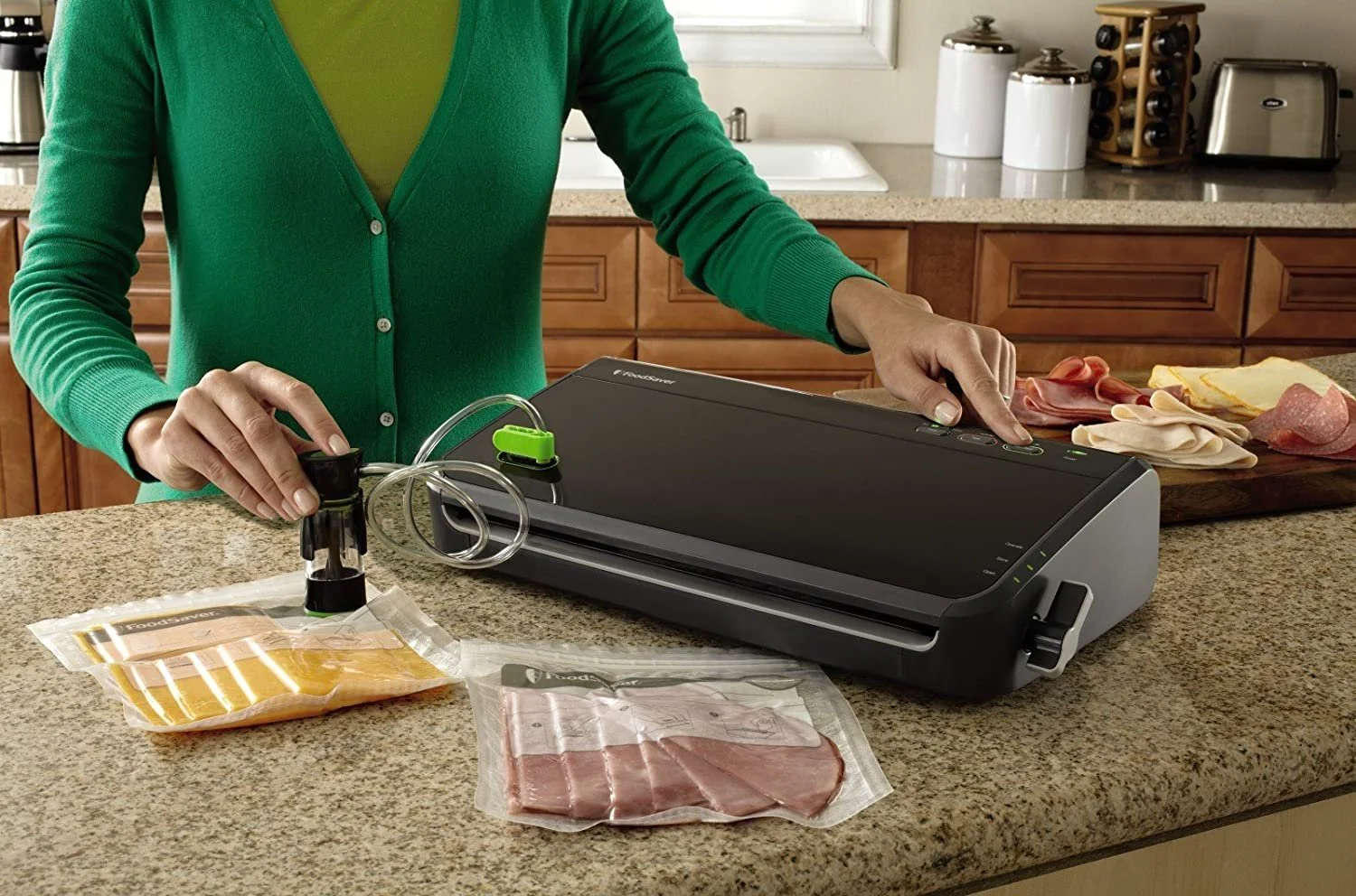 FoodSaver FM2100-000 Vacuum Sealer Machine System with Starter Bags & Rolls Safety Certified