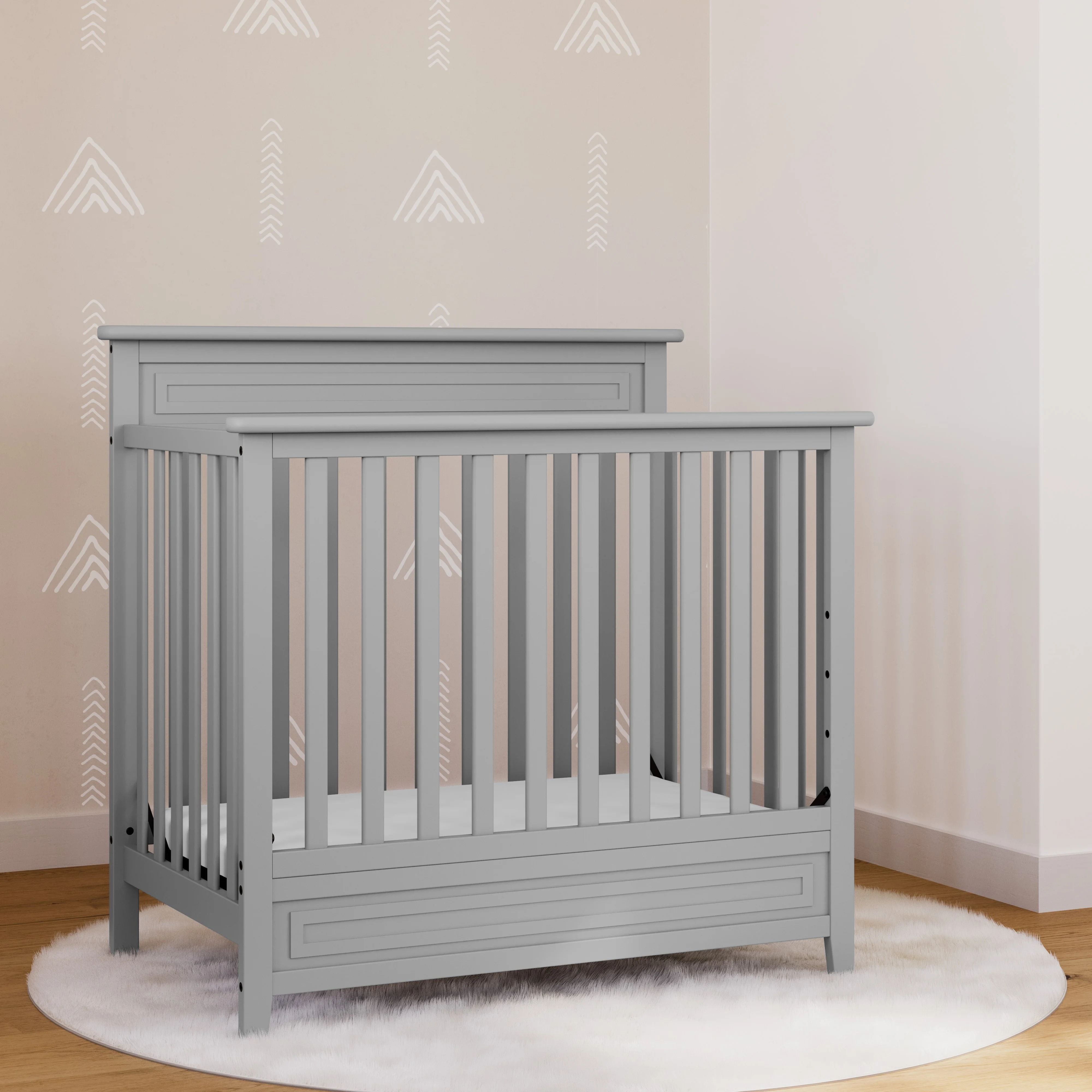 Storkcraft Petal Mini 4-in-1 Convertible Baby Crib with Mini Crib Mattress, Pebble Gray