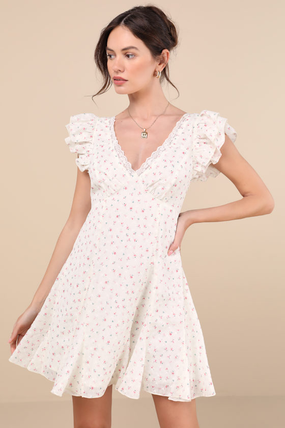 Eben Ivory Ditsy Floral Flutter Sleeve Mini Dress Dress - EJIACHE