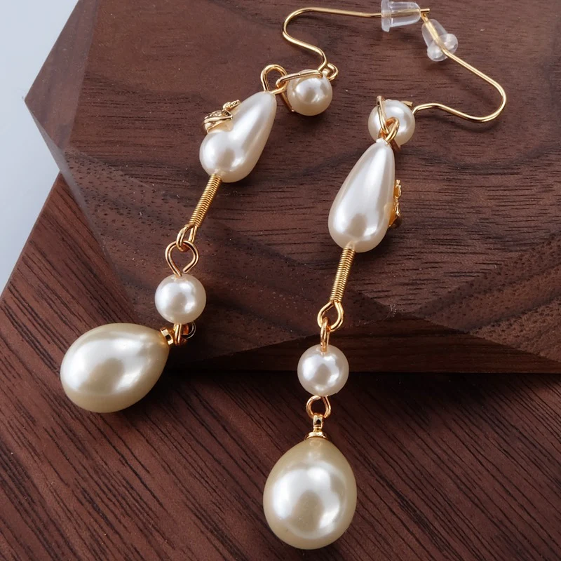 VIVI Teardrop Pearl Saturn Earrings | Best Replica Jewelry™