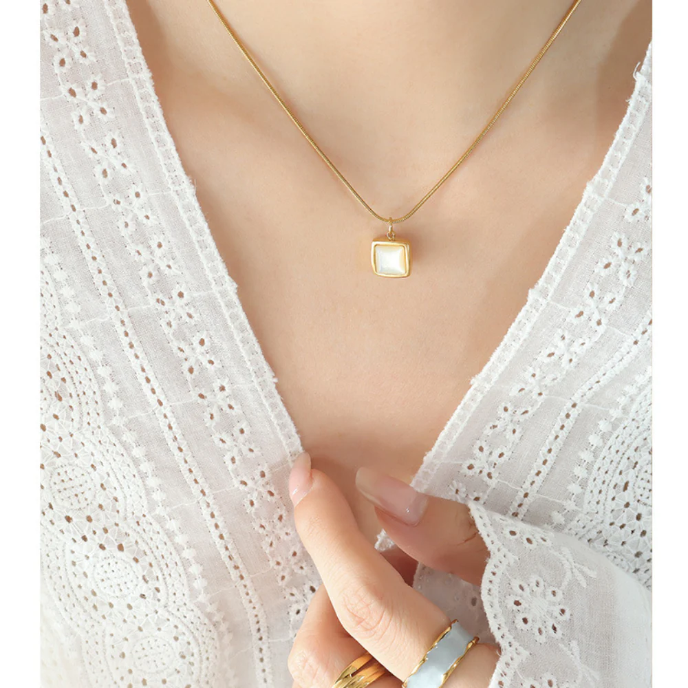 Polished White Scallop Shell Necklace