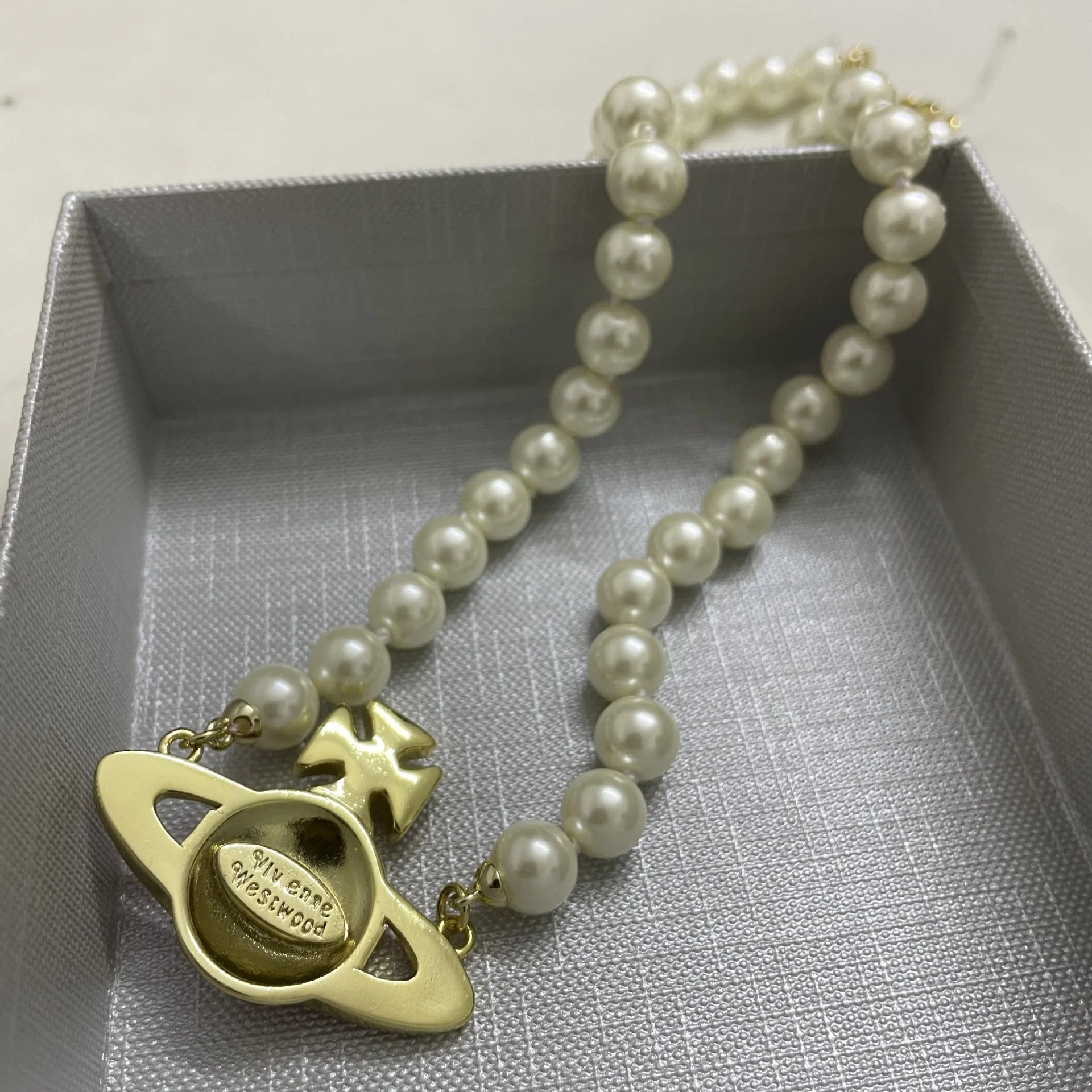 VIVI Pink Flat Saturn Pendant Pearl Necklace | Best Replica Jewelry™