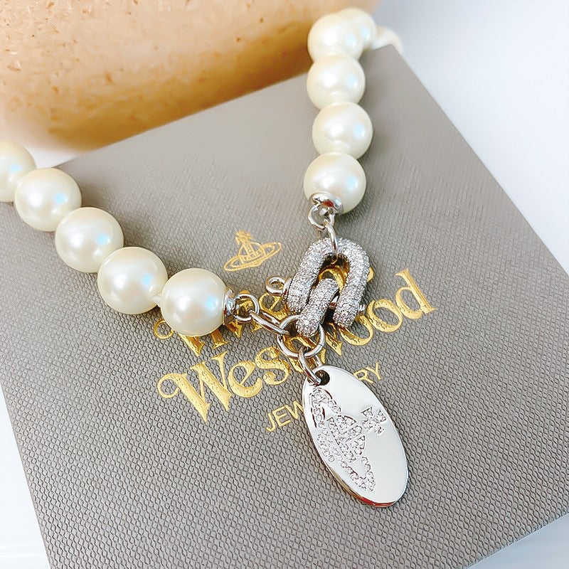 VIVI Horseshoe Clasp Saturn Pearl Necklace | Best Replica Jewelry™