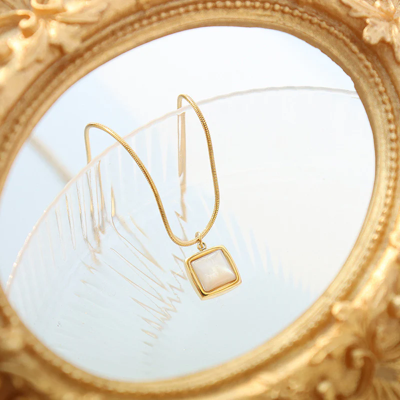 Polished White Scallop Shell Necklace