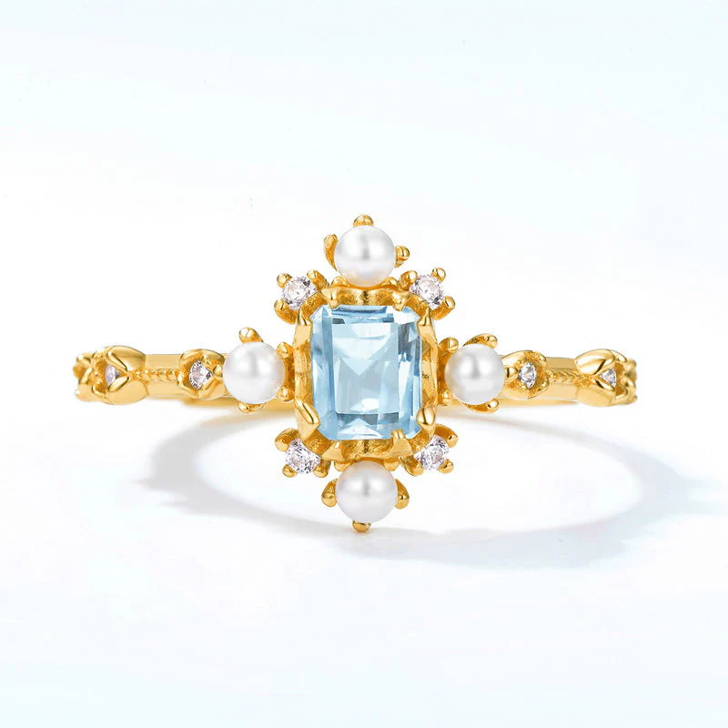Sky Blue Topaz and Pearl Ring