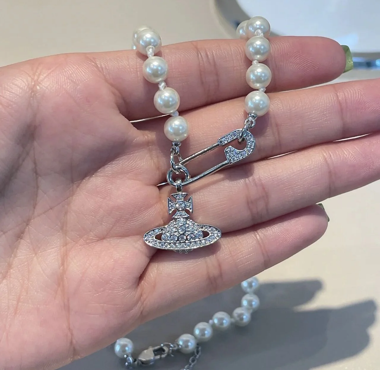 VIVI Saturn Pearl Necklace | Best Replica Jewelry™