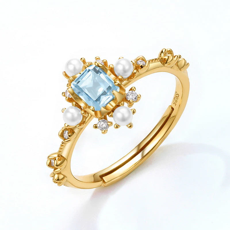 Sky Blue Topaz and Pearl Ring