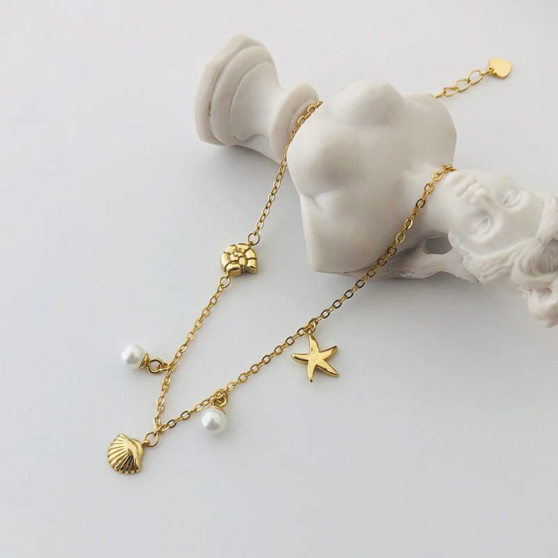 Gold Bracelet With Pearl Charm