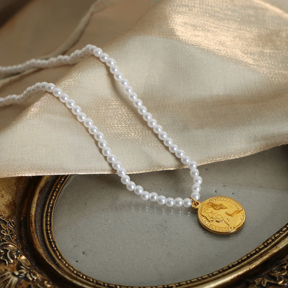 Pearl Necklace With Gold Round Portrait Pendant