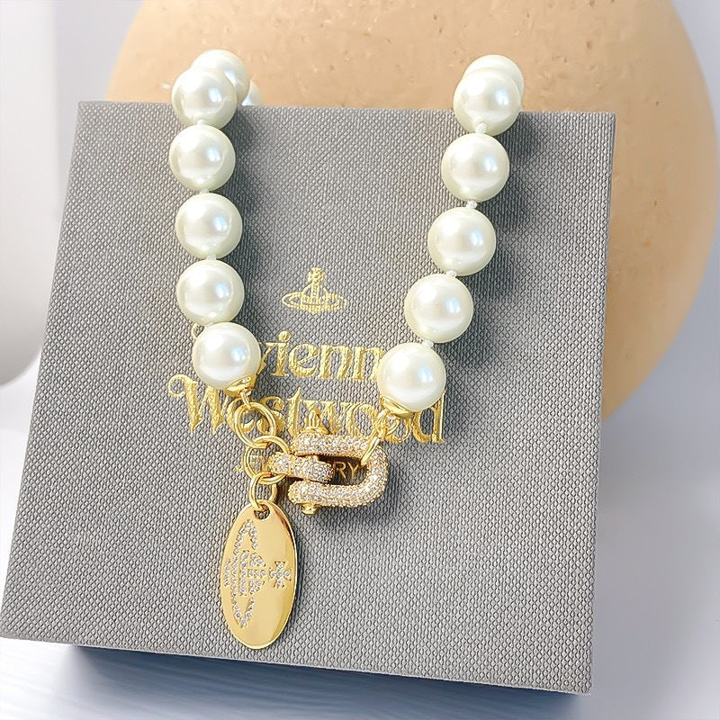 VIVI Horseshoe Clasp Saturn Pearl Necklace | Best Replica Jewelry™