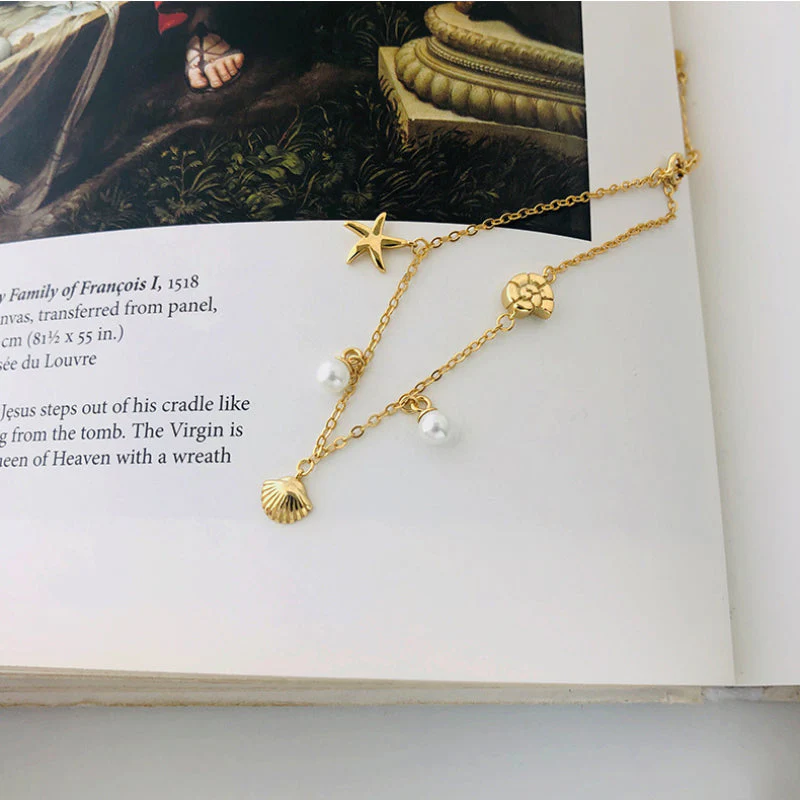 Gold Bracelet With Pearl Charm