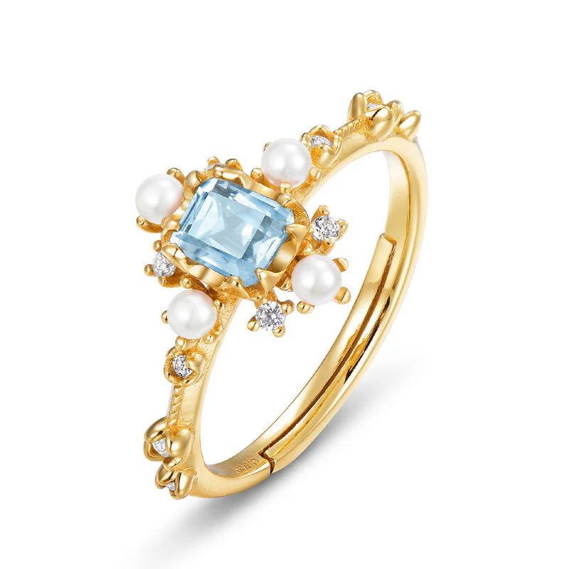 Sky Blue Topaz and Pearl Ring