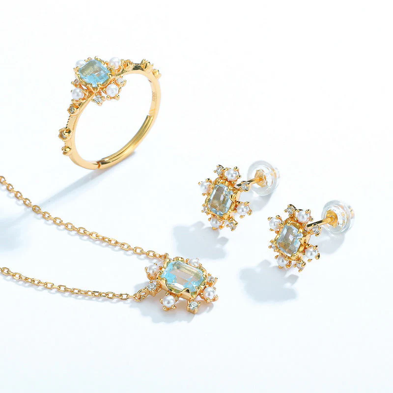 Sky Blue Topaz and Pearl Ring