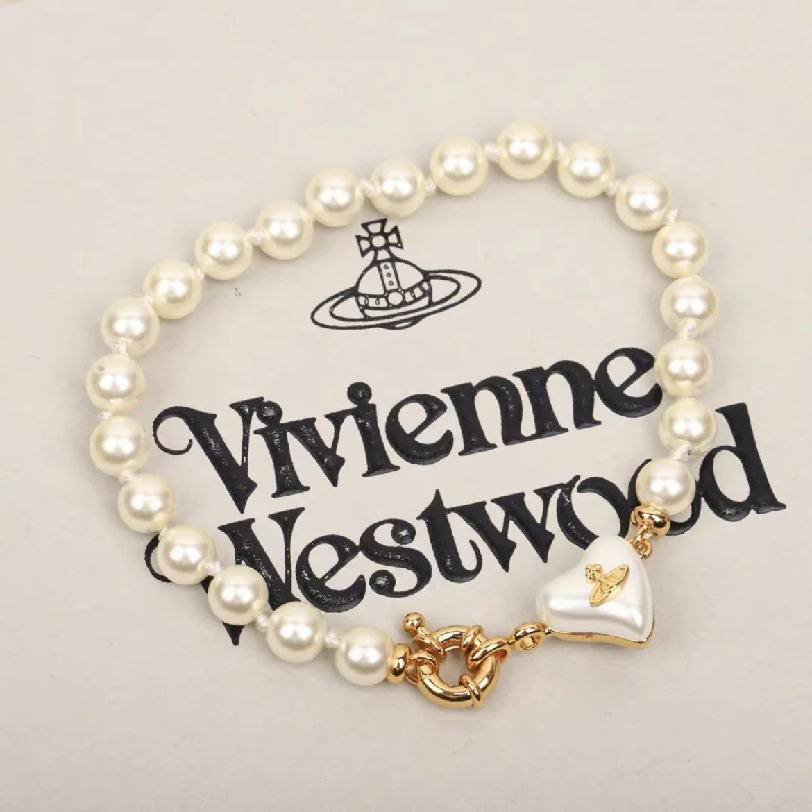 VIVI Heart Charm Anchor Clasp Pearl Bracelet | Best Replica Jewelry™