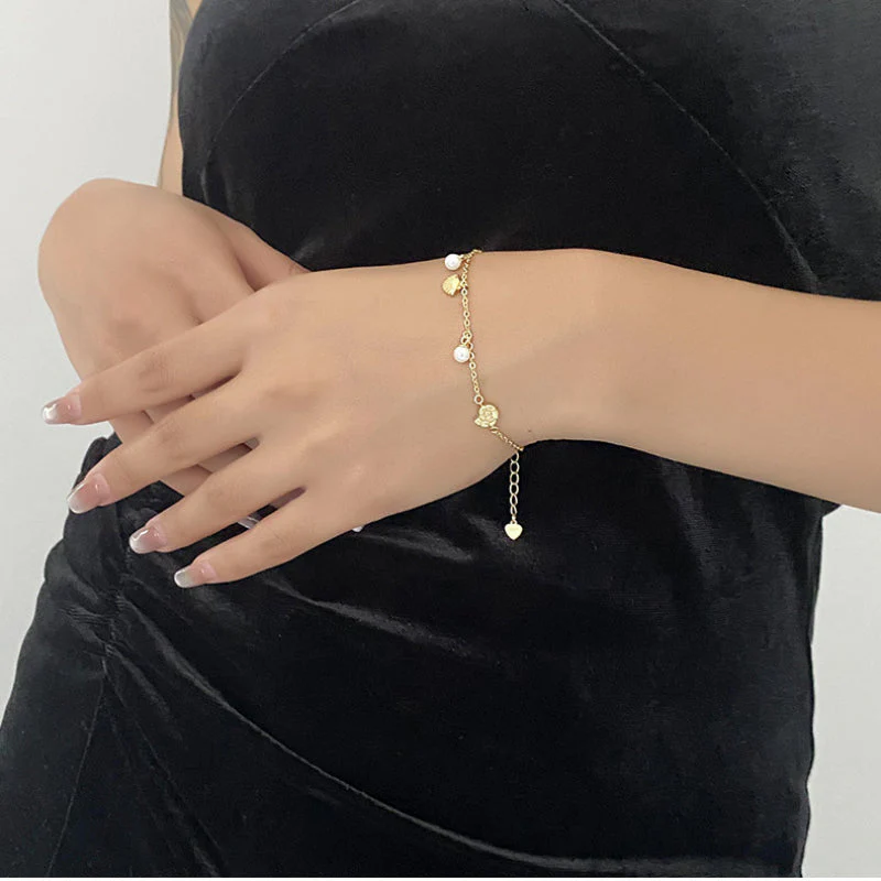Gold Bracelet With Pearl Charm