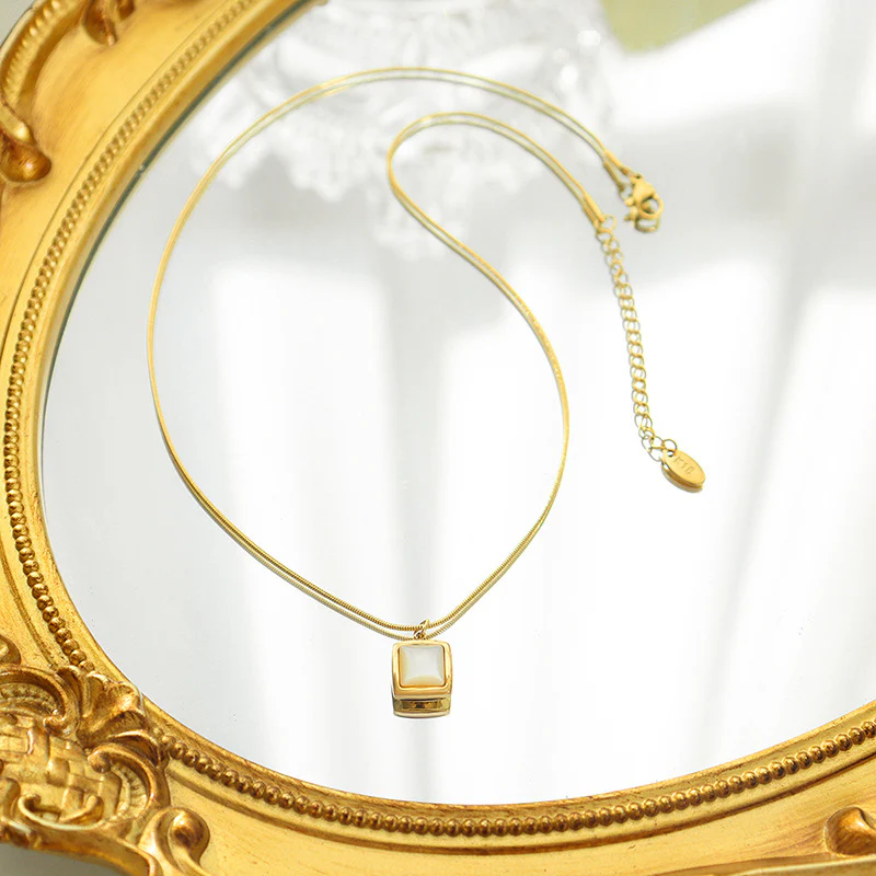 Polished White Scallop Shell Necklace