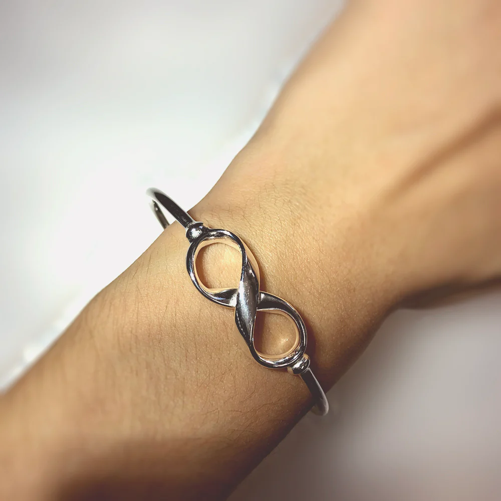 Sterling Silver Infinity Ball Torque Bangle
