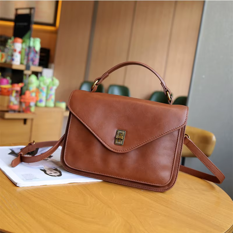 High - end cross - body bags for women, 2025 new - style retro messenger bags, fashionable soft - leather commuting bags, should