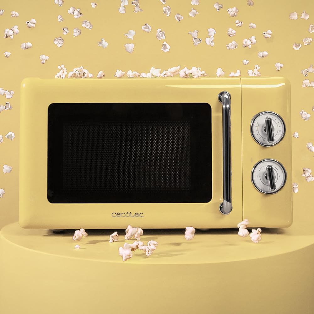 Cecotec Micro-Ondes Mécanique avec Grill Proclean 3110 Retro Bleu. 20 L, 700 W en 6 niveaux, minuterie jusqu'à 30 minutes, mode dégivrage, design vintage bleu, finitions en acier.