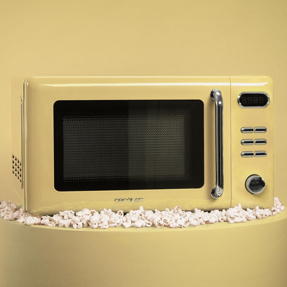 Cecotec Micro-Ondes Mécanique avec Grill Proclean 3110 Retro Bleu. 20 L, 700 W en 6 niveaux, minuterie jusqu'à 30 minutes, mode dégivrage, design vintage bleu, finitions en acier.