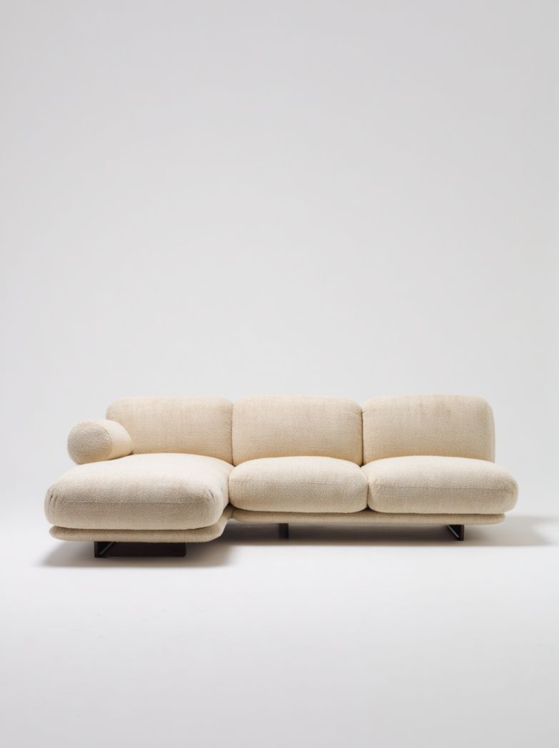 Canapé d'angle en tissu bouclette beige clair méridienne gauche avec coussin cylindrique