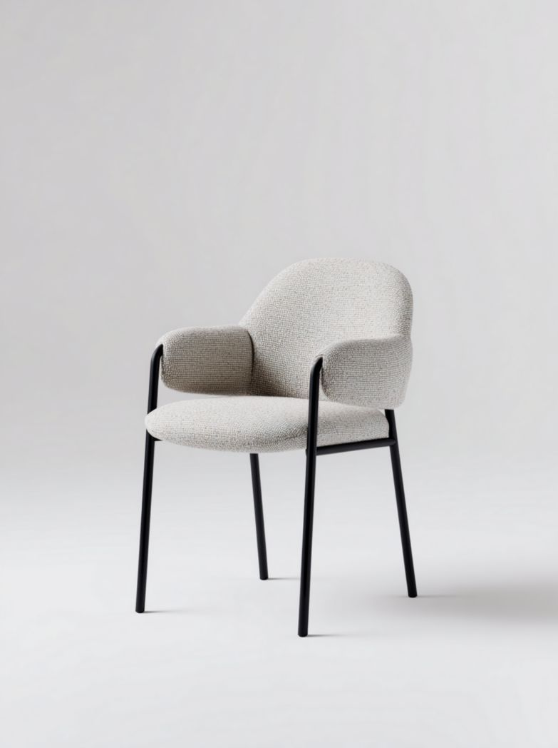 Fauteuil rembourré en tissu gris clair avec dossier arrondi et structure en métal noir