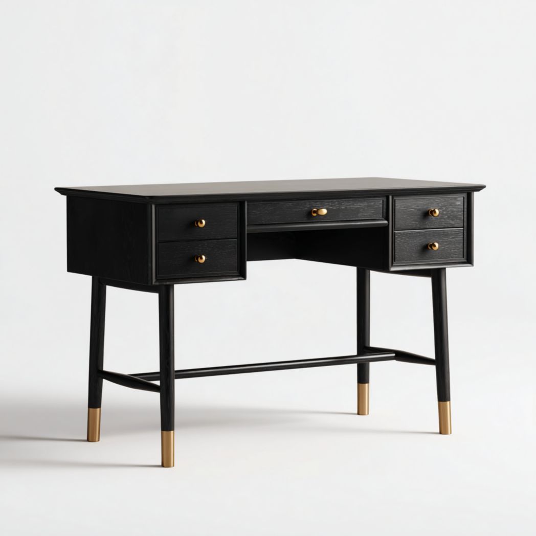 Bureau rectangulaire noir à cinq tiroirs avec poignées et pieds dorés