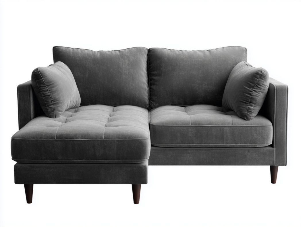 Canapé d'angle en tissu gris avec coussins et motif à carreaux matelassé