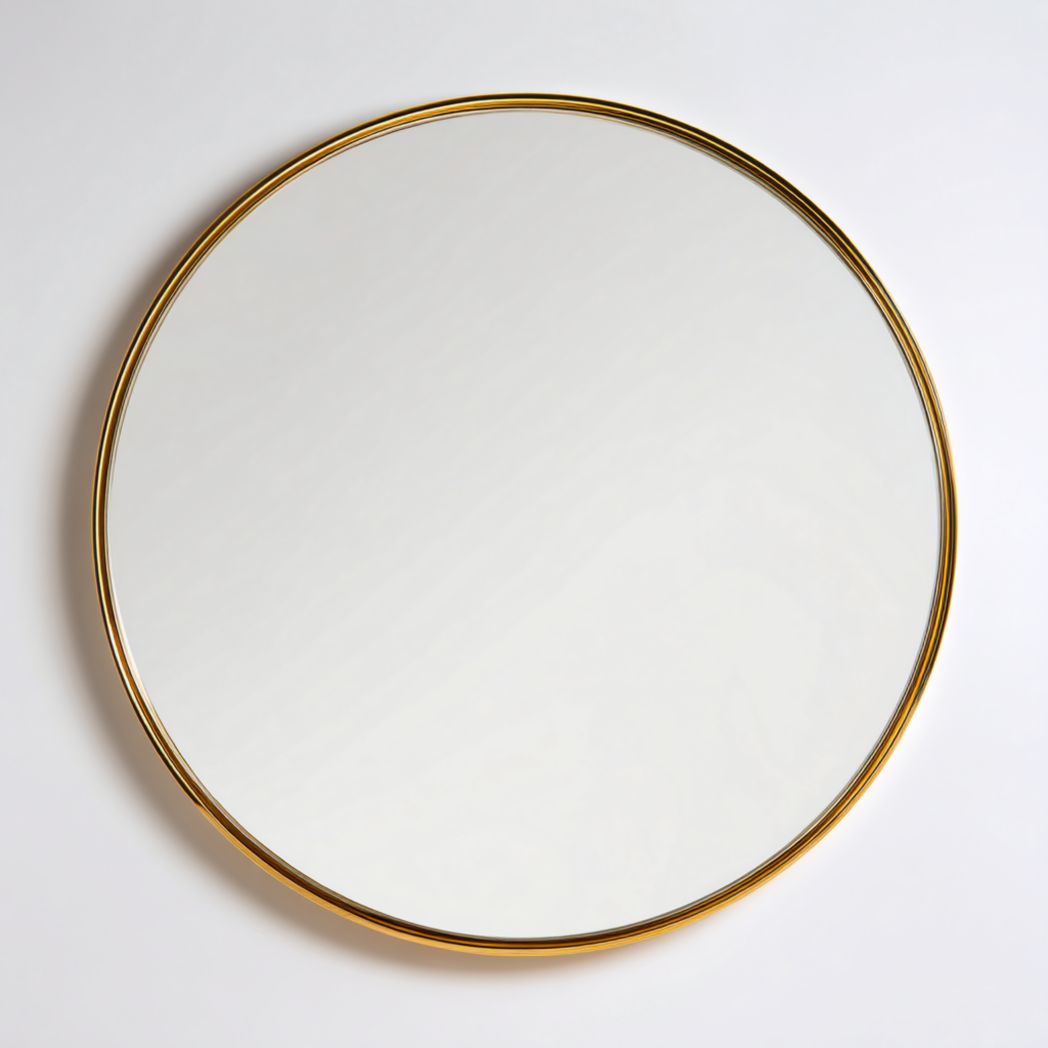Miroir rond avec cadre métallique doré