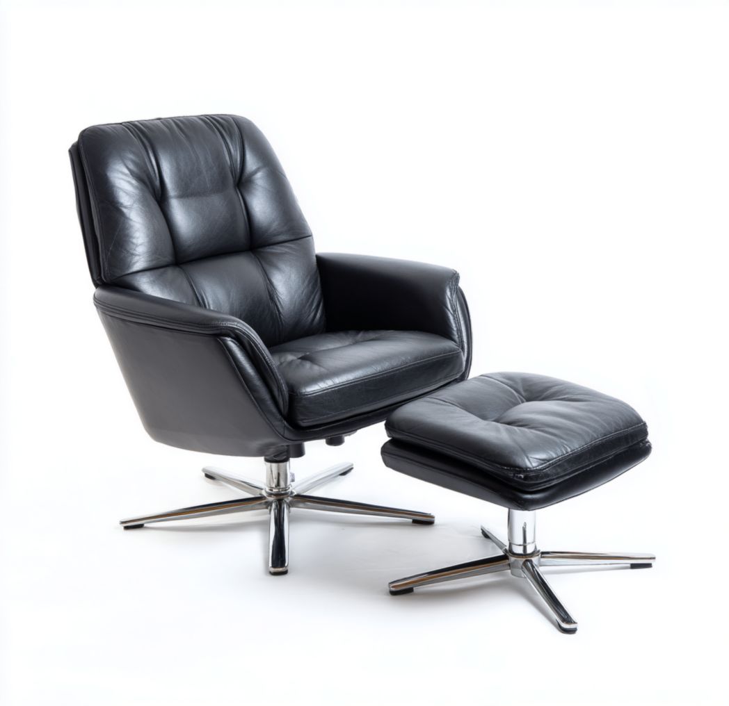 Fauteuil en cuir noir avec repose-pieds, piètement métallique à quatre branches