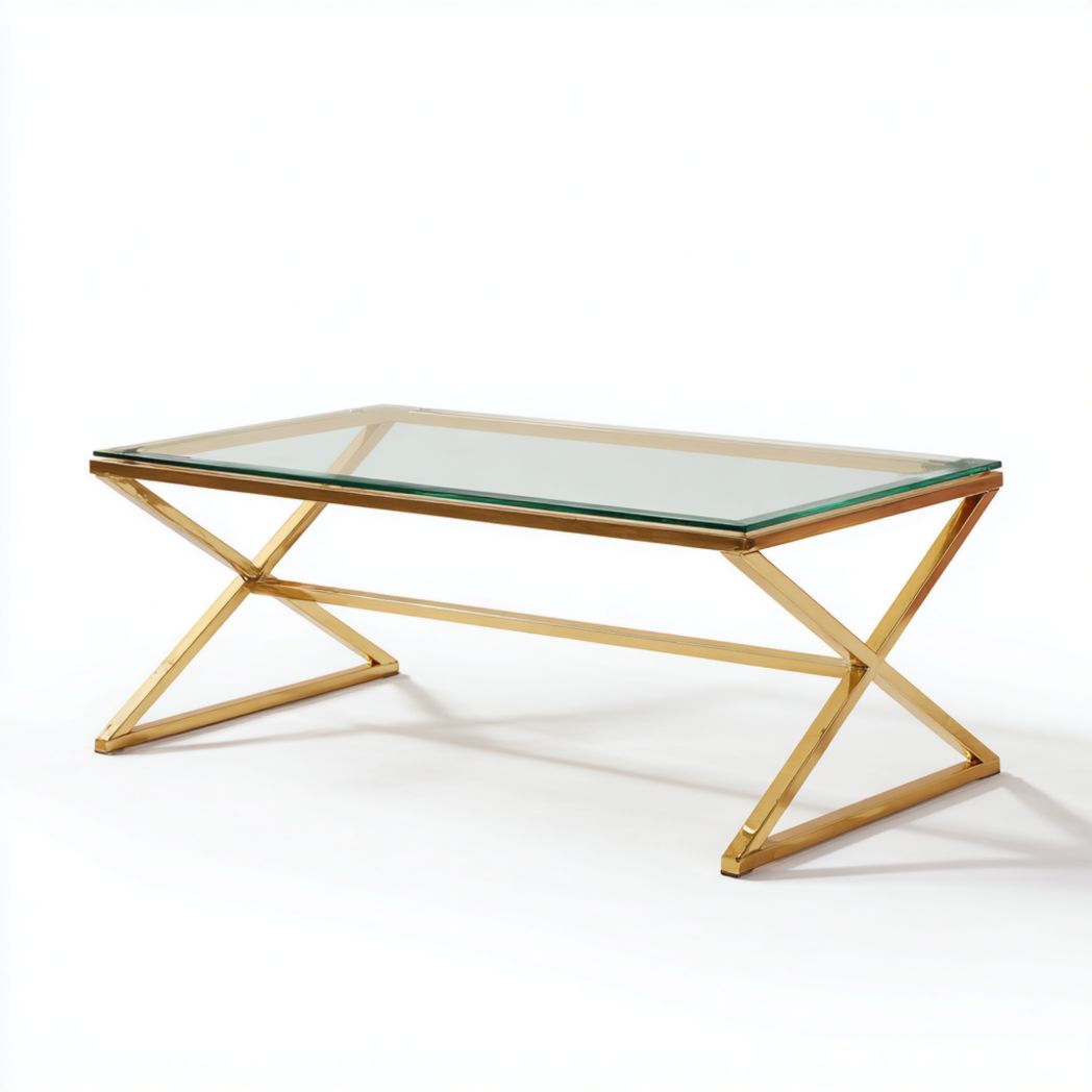 Table basse rectangulaire avec plateau en verre et base métallique dorée en croix