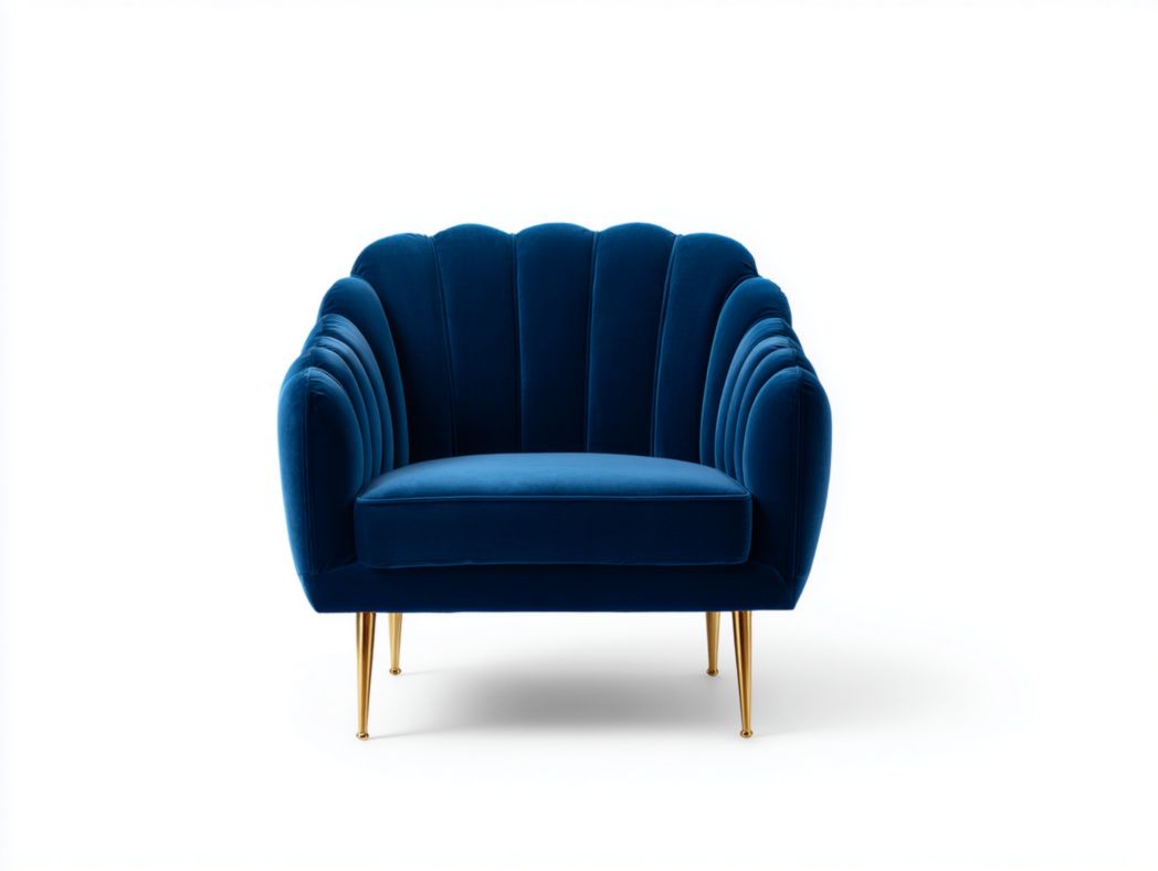 Fauteuil en velours bleu à dossier coquille avec pieds en métal doré
