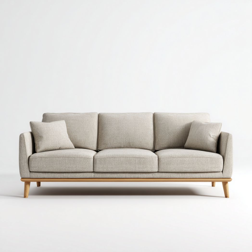 Canapé 3 places en tissu beige clair avec 2 coussins beige clair et base en bois brun clair