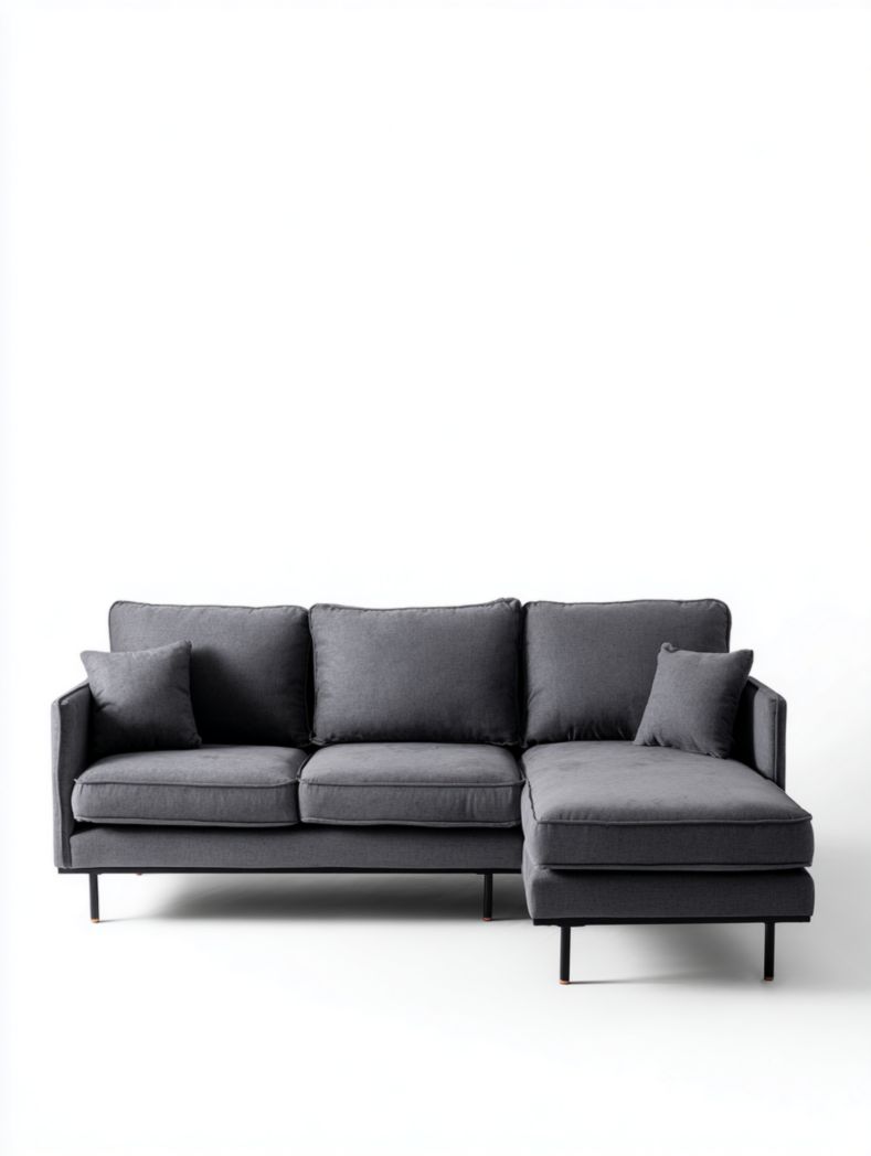 Canapé d'angle en tissu gris foncé avec deux coussins et pieds en métal noir
