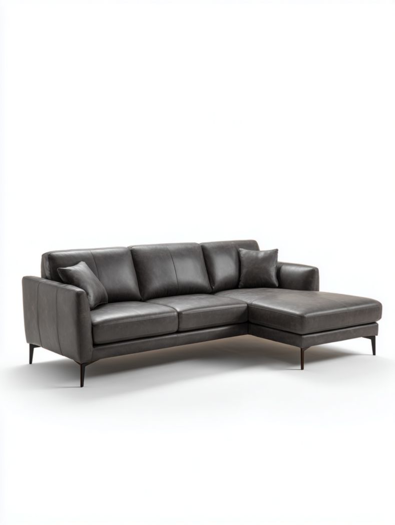 Canapé d'angle en cuir gris foncé avec deux coussins et pieds en métal noir