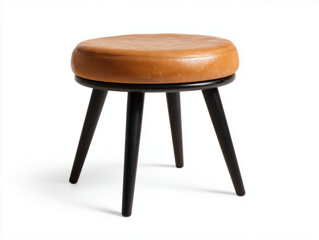 Tabouret rond en cuir marron avec pieds en bois noir