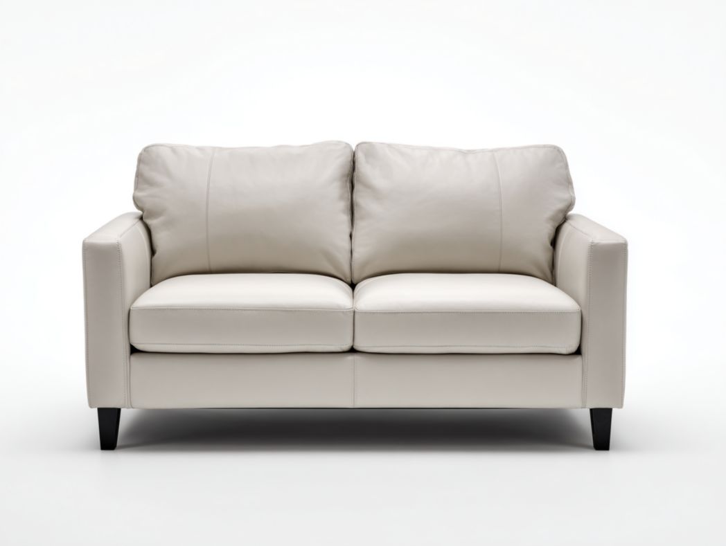 Canapé 2 places en cuir blanc cassé, pieds noirs