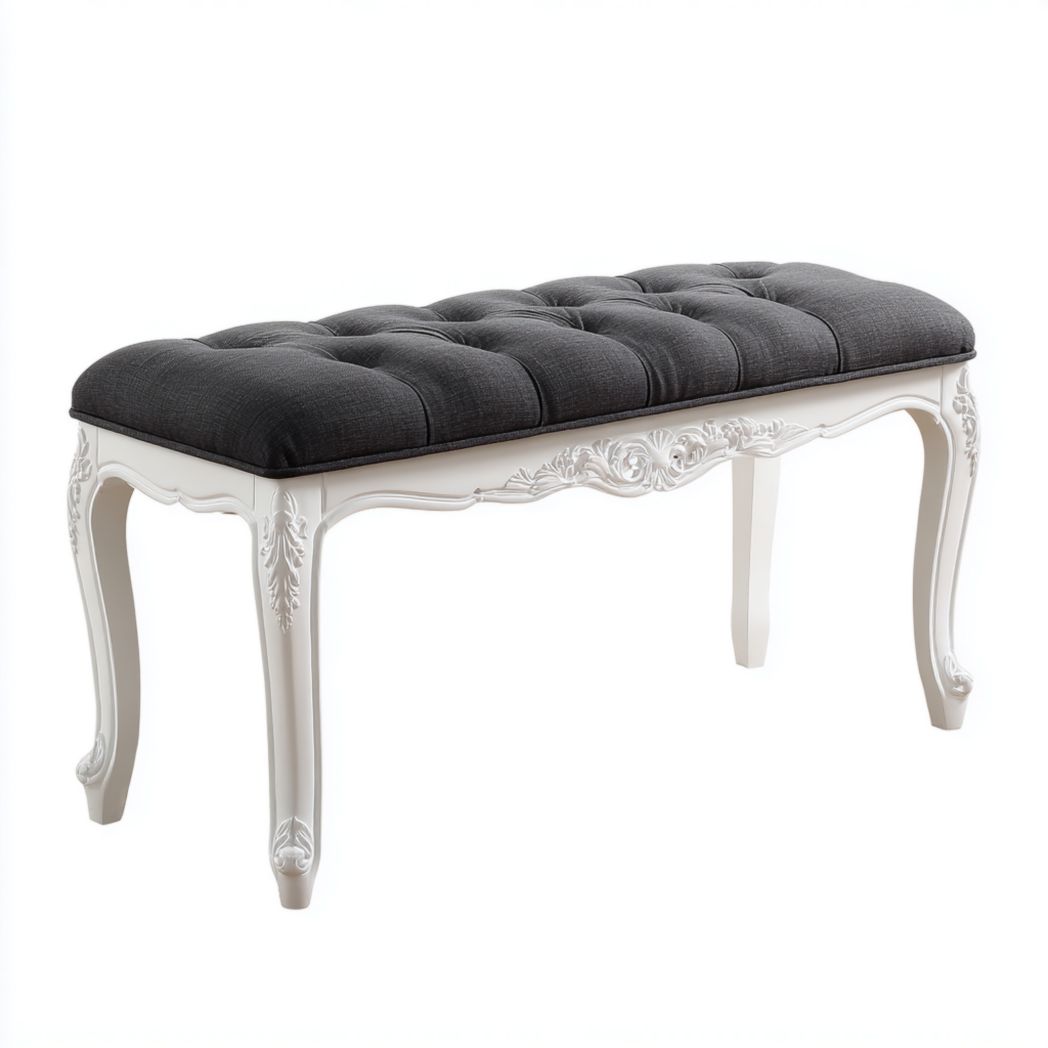 Banc sculpté en tissu gris foncé avec pieds en bois blanc
