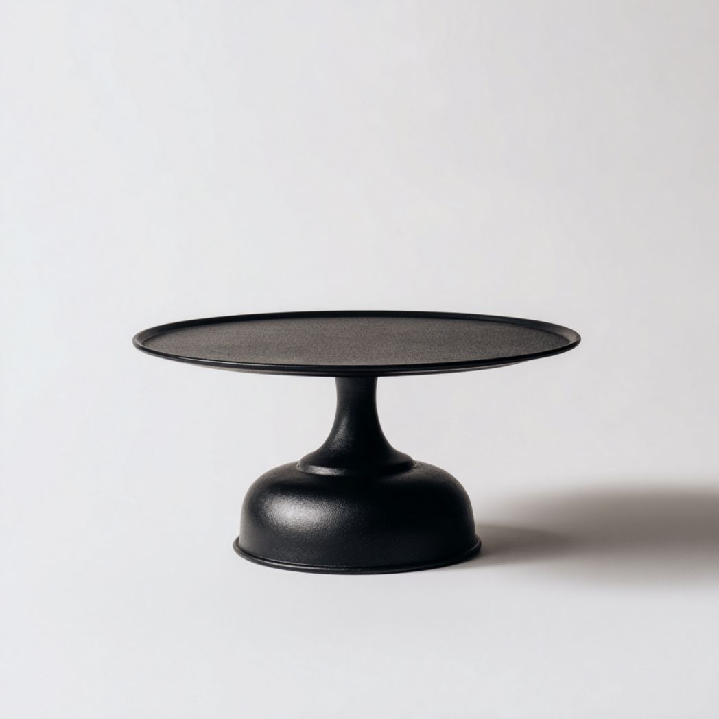 Table basse ronde noire avec base surélevée