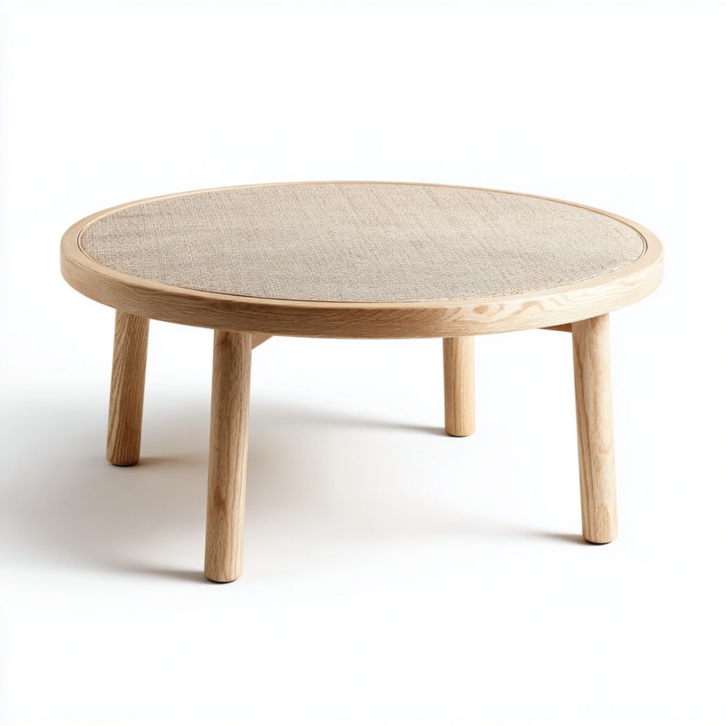 Table basse ronde avec plateau beige et pieds brun clair en bois massif