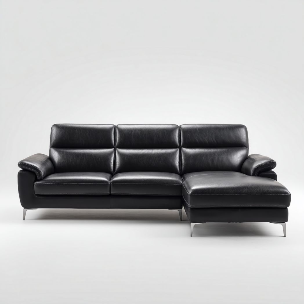 Canapé d’angle en cuir synthétique noir avec dossier à sections et pieds en métal argenté
