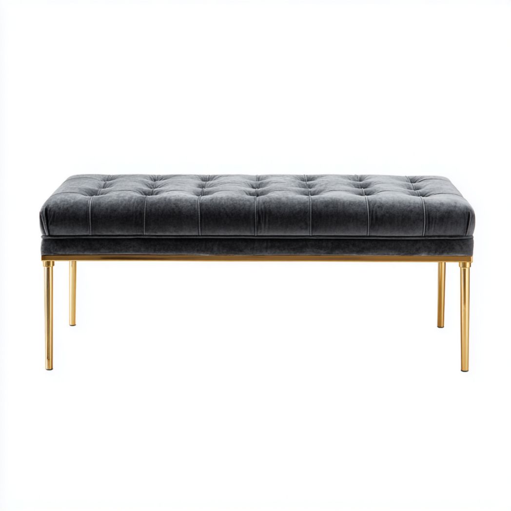 Banc en tissu noir avec pieds en métal doré et assise rembourrée.