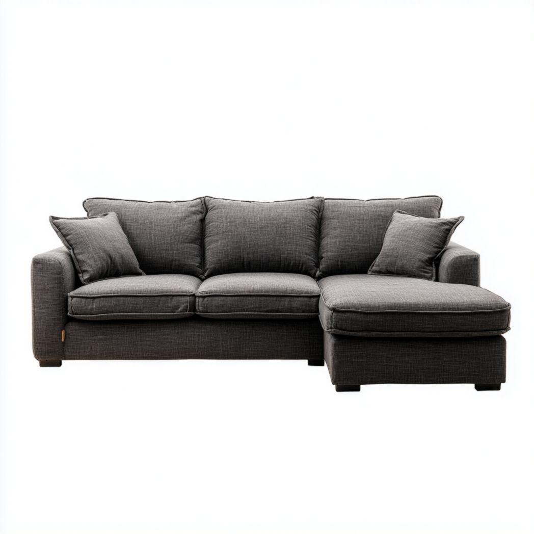 Canapé d'angle en tissu gris foncé, design en L, avec coussins
