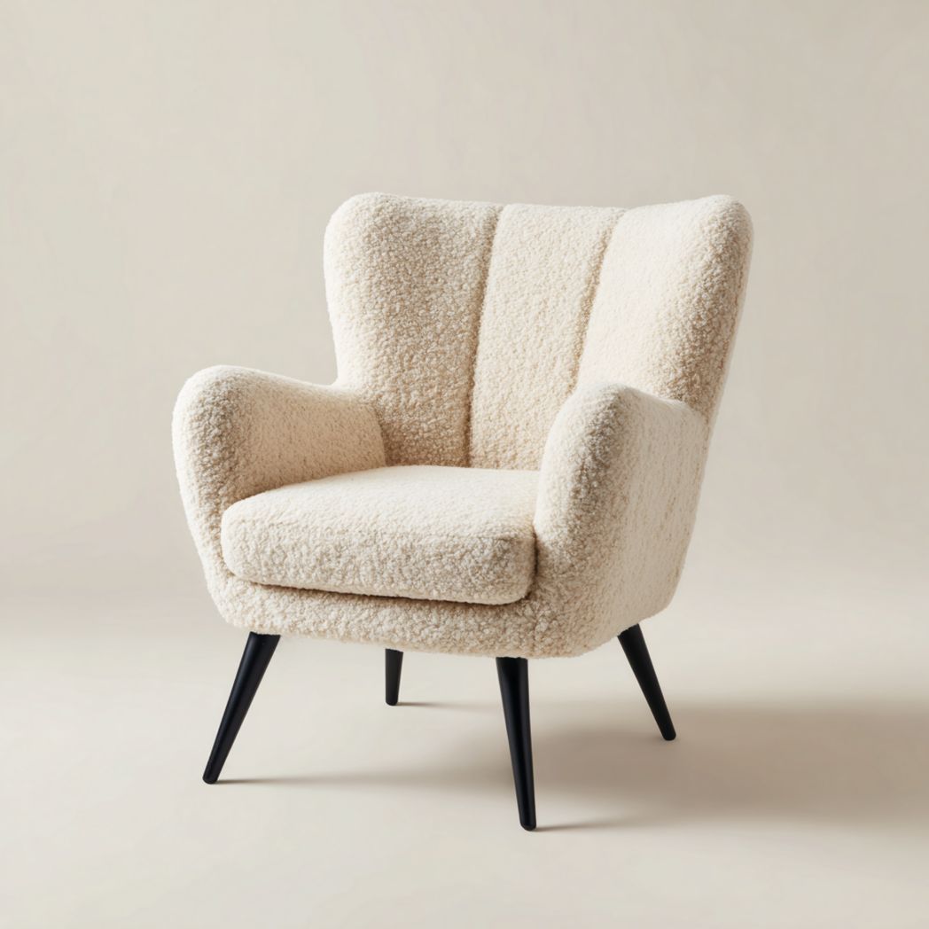 Fauteuil en tissu bouclé blanc cassé, pieds métalliques noirs