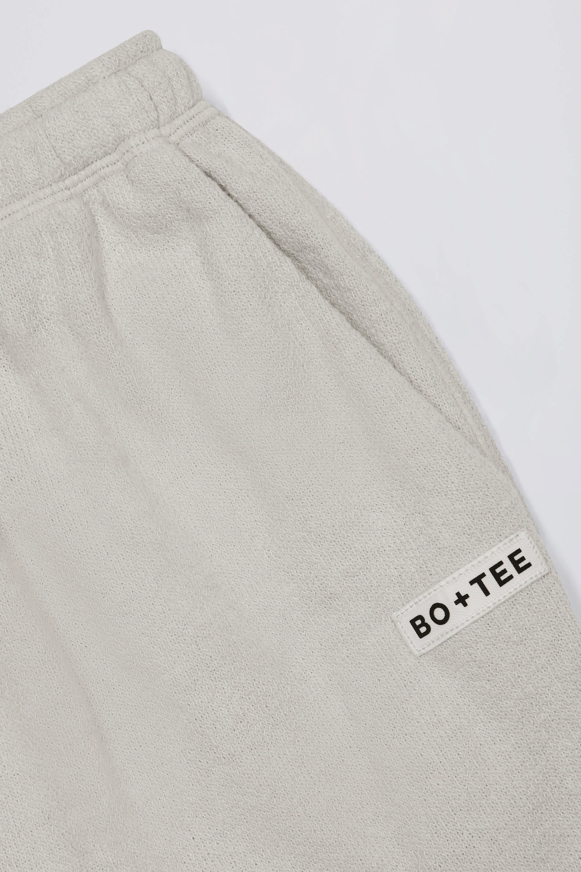 Button-Detail Low-Rise Wide-Leg Joggers in Light Grey